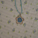 Turquoise flower necklace is being swapped online for free