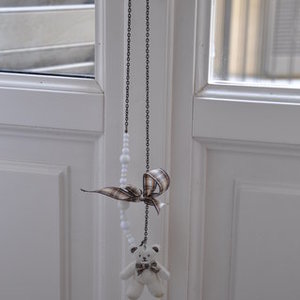 Teddy bear cute necklace is being swapped online for free