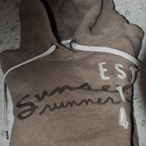 LOGG by H&M brown sweater is being swapped online for free