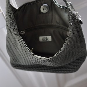 the sak military green hand knitted bag is being swapped online for free