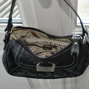 Guess Black Hand Bag is being swapped online for free