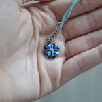 Cute blue flower necklace is being swapped online for free