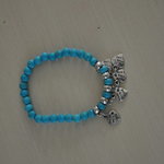 Turquoise bracelet with charms is being swapped online for free