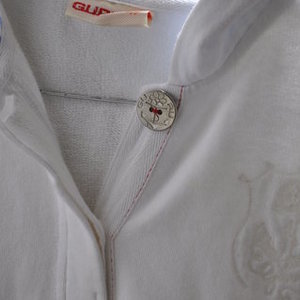 Anchor white sweatshirt by Guru is being swapped online for free