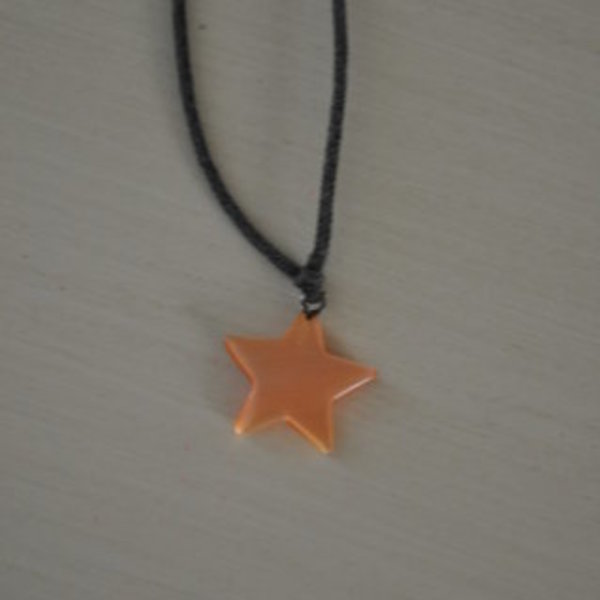 Star necklace in orange is being swapped online for free
