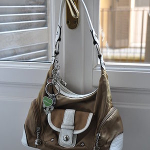 Kathy Van Zeeland Shoulder Bag is being swapped online for free