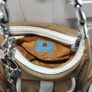 Kathy Van Zeeland Shoulder Bag is being swapped online for free