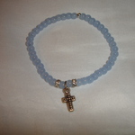 Blue beaded cross + rhinestone bracelet is being swapped online for free