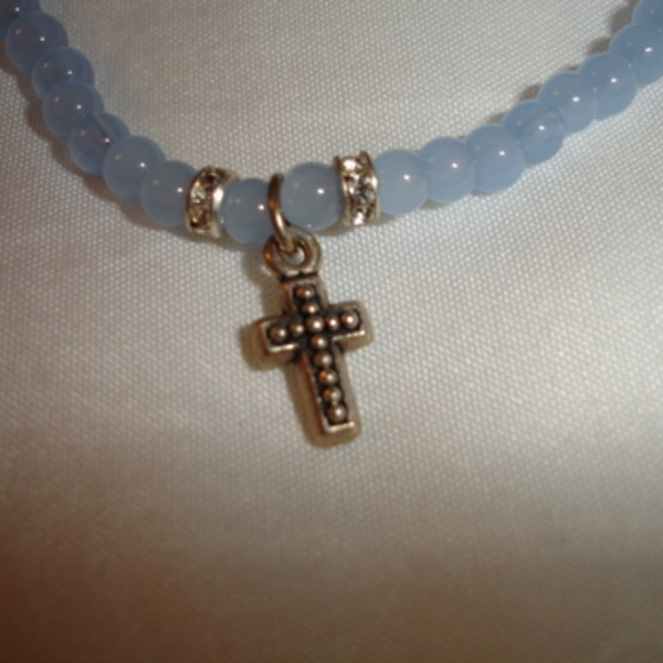 Blue beaded cross + rhinestone bracelet is being swapped online for free