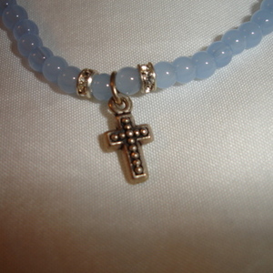 Blue beaded cross + rhinestone bracelet is being swapped online for free