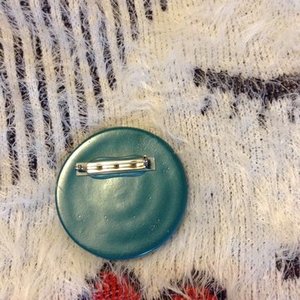 80's pin or broach is being swapped online for free
