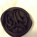 Black flower pin or hair clip is being swapped online for free