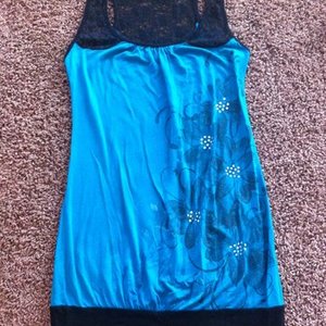 Cute Teal Tunic Size Small is being swapped online for free