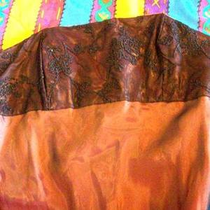 black && orange dress is being swapped online for free