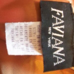 black && orange dress is being swapped online for free