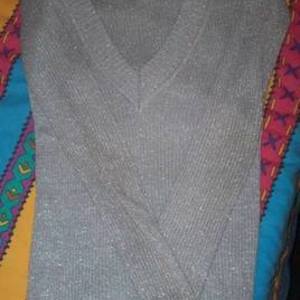 Grey long sleeved V-neck sweater is being swapped online for free