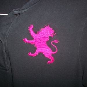 Black Polo w/ Pink Lion is being swapped online for free