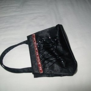 Small Black Beaded Purse is being swapped online for free