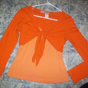 No Boundaries Small Orange Shirt is being swapped online for free