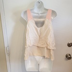 Philosophy Crochet Ruffled Tank is being swapped online for free