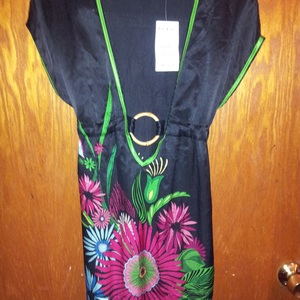 BEBE Tunic Low Cut Summer Top is being swapped online for free