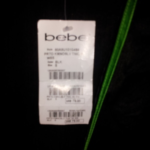 BEBE Tunic Low Cut Summer Top is being swapped online for free