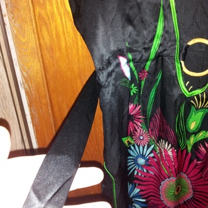 BEBE Tunic Low Cut Summer Top is being swapped online for free