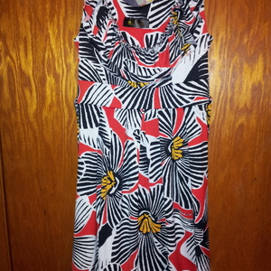 LUNA TIKS VERY FLATTERING PRINTED DRESS is being swapped online for free