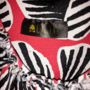 LUNA TIKS VERY FLATTERING PRINTED DRESS is being swapped online for free