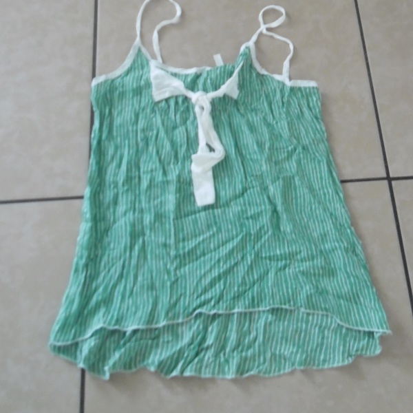 Green and White Sleeveless Top is being swapped online for free