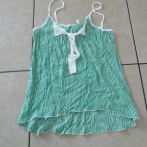 Green and White Sleeveless Top is being swapped online for free
