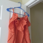 Orange Sleeveless Top is being swapped online for free