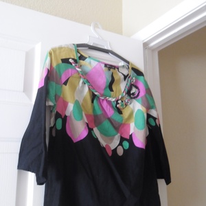 Colorful 3/4  Sleeve Top is being swapped online for free