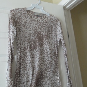 Brown and White Long Sleeve is being swapped online for free