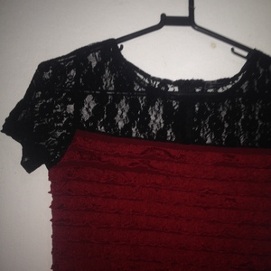 burgundy/black dress is being swapped online for free