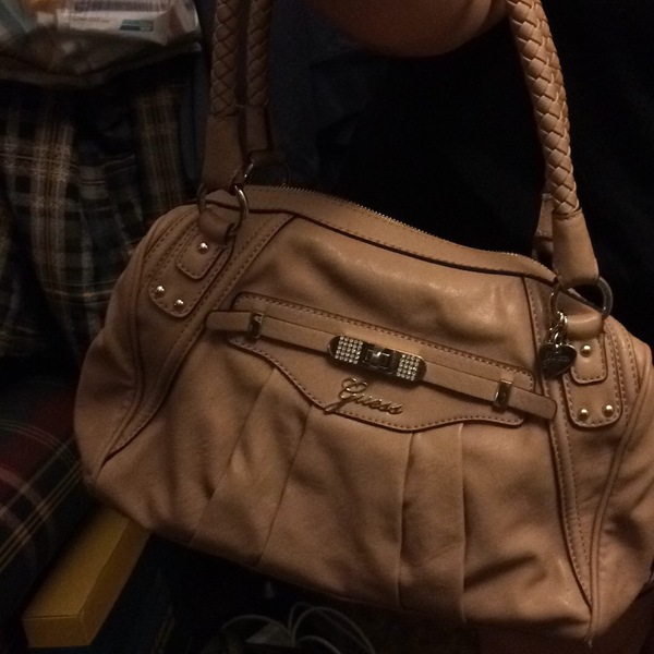 Beige Guess Handbag is being swapped online for free