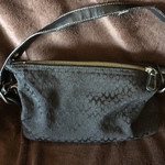 Black Coach purse is being swapped online for free