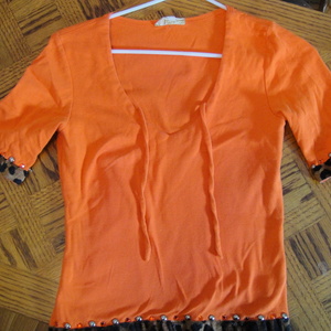 Orange Animal Print Top is being swapped online for free