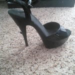 Open toe black stiletto heels is being swapped online for free