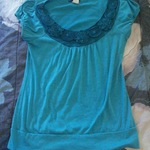 Teal Blouse is being swapped online for free
