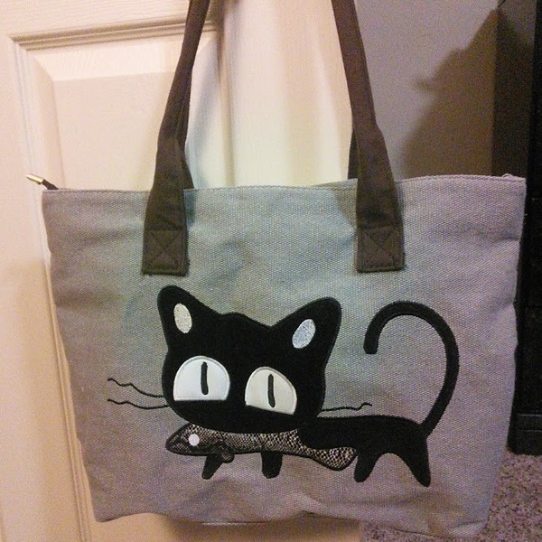 Cute Cat Purse is being swapped online for free