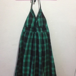 green/black plaid dress is being swapped online for free