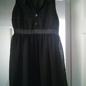 Nice black button up dress with collar sleeveless is being swapped online for free