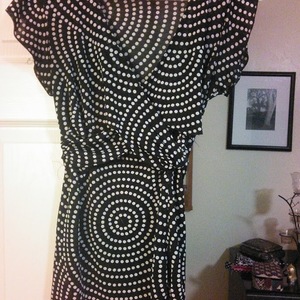 Polka dot v-neck blouse is being swapped online for free