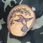 Wooden hummingbird brooch is being swapped online for free