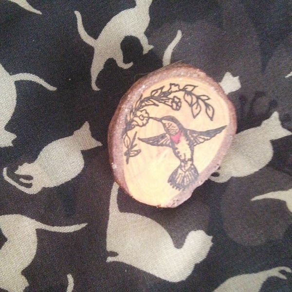 Wooden hummingbird brooch is being swapped online for free