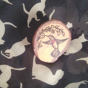 Wooden hummingbird brooch is being swapped online for free