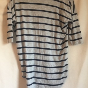 Cozy gray/striped 3/4 length tee  is being swapped online for free