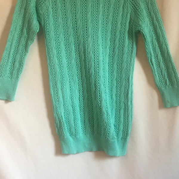 Teal knit sweater  is being swapped online for free