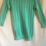 Teal knit sweater  is being swapped online for free